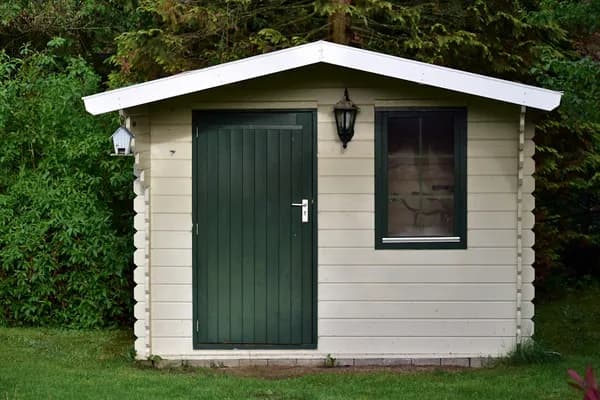 Inside the Woodbridge Plus Vinyl Storage Shed Review Cover