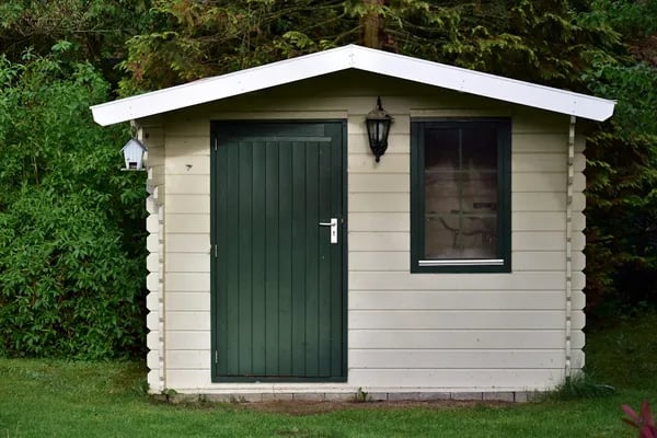 Inside the Woodbridge Plus Vinyl Storage Shed Review Cover