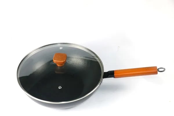 Beyond the Stir-Fry: How to Choose and Care for the Best Wok for a Lifetime of Cooking Cover